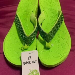 New Oncai Green Flip Flops size 9